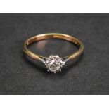 An 18ct gold and platinum, diamond-set single-stone ring, the diamond approximately 1/4ct,