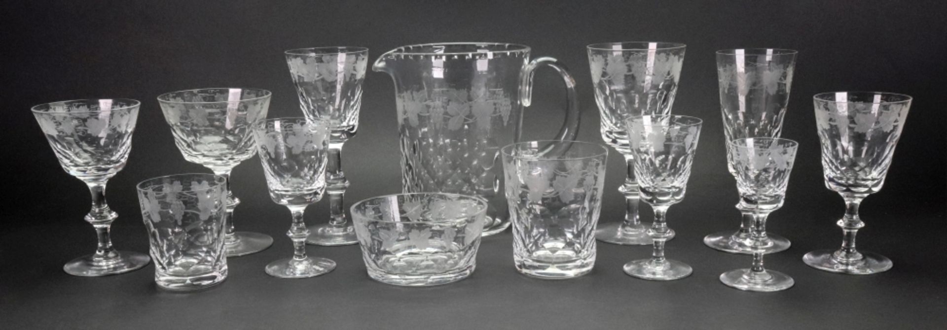 A suite of Edinburgh facet cut and fruiting vine etched glassware, 122 pieces,