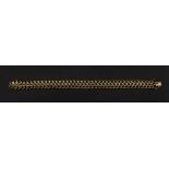 A 9ct gold fancy-link bracelet, of curved design,