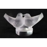 A Lalique crystal kissing doves paperweight, etched Lalique France, 4.5cm high. Illustrated.