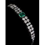 An 18ct white gold, emerald and diamond-set bracelet,