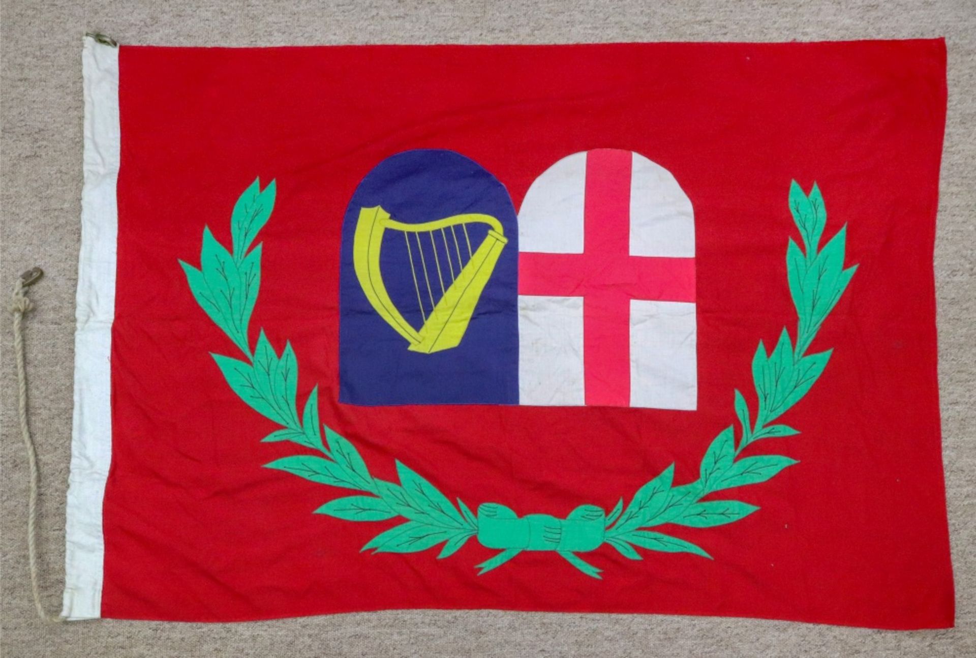 The flag of a General at sea, with the shield of England and the golden yellow harp of Ireland,