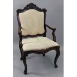 A Regence walnut frame fauteuil,