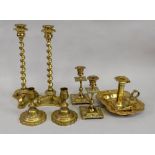 A pair of brass spiral column candlesticks, in late 17th century style,