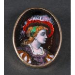 An enamelled brooch,