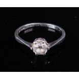 An 18ct white gold and platinum single-stone diamond ring, the circular-cut diamond approximately 0.