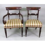 A set of eight William IV mahogany dining chairs, the moulded frames with leaf carved top rails,
