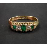 A late Victorian gold, five-stone emerald and diamond ring, W.G.M.