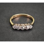 An 18ct gold and five-stone diamond ring,