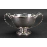 A silver two handled trophy, Adie Brothers, Birmingham 1926, in mid 18th century style,