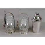 A pair of electroplate pickle jar stands and forks,