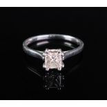 A platinum and diamond single-stone ring, the Princess-cut diamond approximately 0.