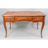 A reproduction Louis XV style kingwood gilt metal mounted bureau plat,