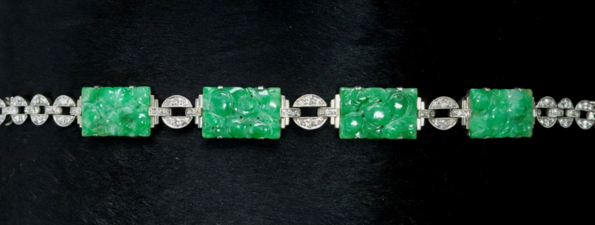 A jadeite and diamond-set bracelet, composed of four carved rectangular jadeite plaques, - Image 5 of 6