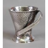 An Art Nouveau silver christening mug, Samuel Jacob, London 1905, spot hammered,