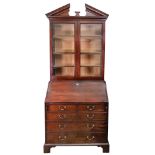 A George III mahogany bureau bookcase,