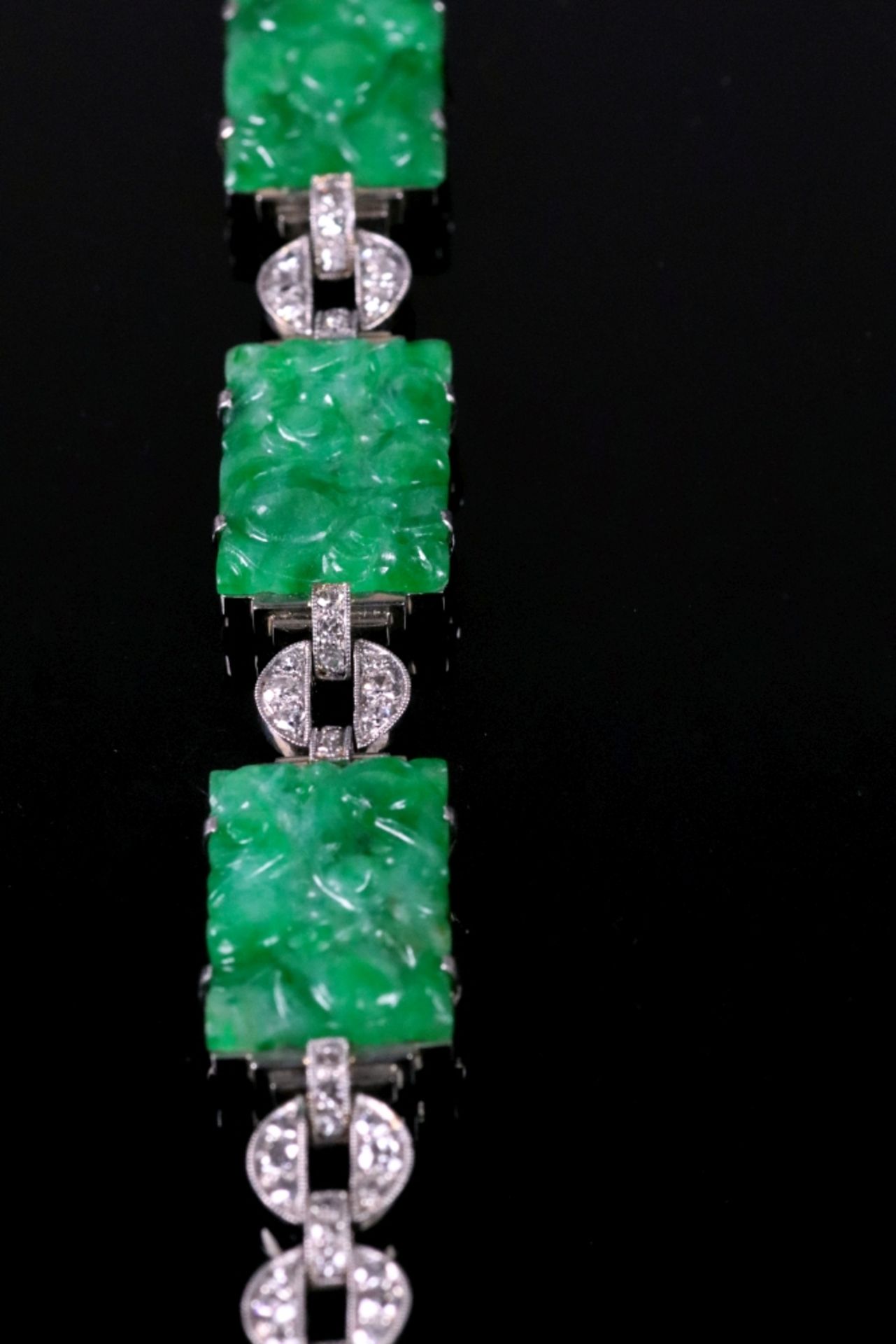 A jadeite and diamond-set bracelet, composed of four carved rectangular jadeite plaques, - Image 4 of 6