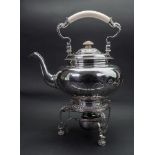 A George I style silver spirit kettle on stand, Mappin & Webb, London 1925, the burner,