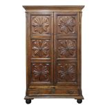 A French walnut provincial armoire, late 18th/early 19th century, of panelled construction,