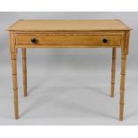 A Regency grained faux pine side table, with ebonised stringing and detail,