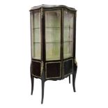 A Louis XV style rosewood marquetry gilt metal mounted vitrine, circa 1880, of serpentine outline,