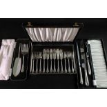 A cased set of six pairs of electroplate Pembury pattern fish knives and forks and matching cased