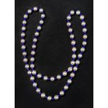 A cultured pearl and lapis lazuli single strand necklace,