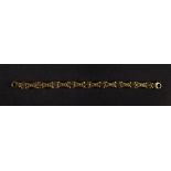 A 9ct bi-gold fancy-link bracelet, composed of alternating stylised flowerheads and bars,