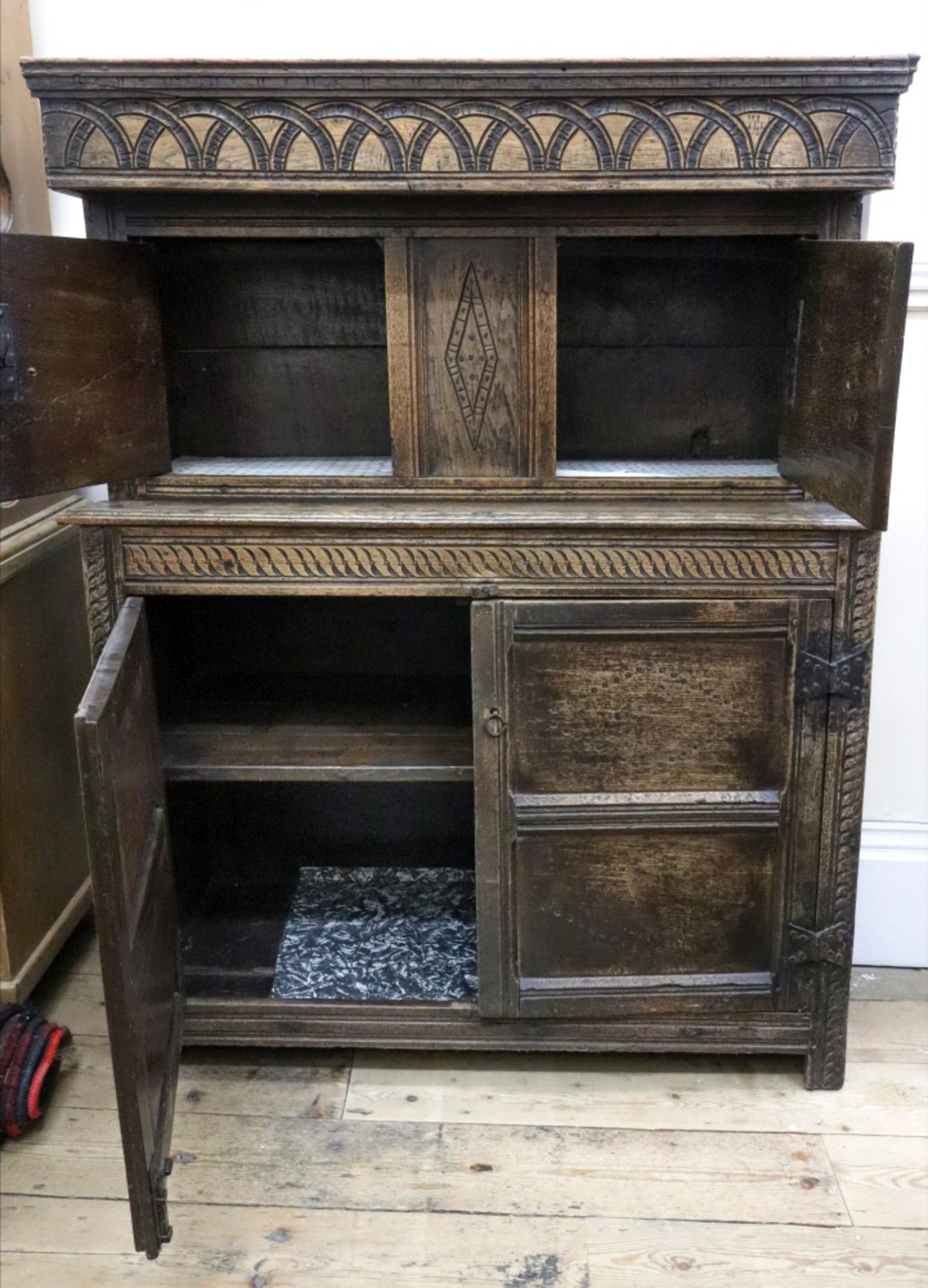 A Jacobean carved oak court cupboard, of panelled construction, - Image 2 of 2