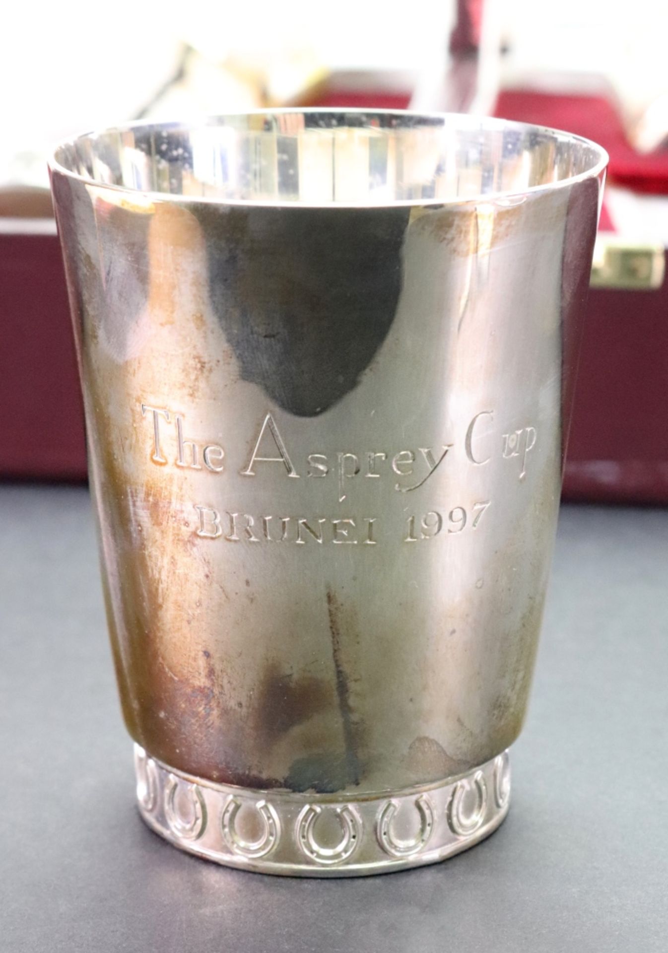 Asprey; a cased set of four electroplate beakers, each engraved 'The Asprey Cup, - Image 2 of 2