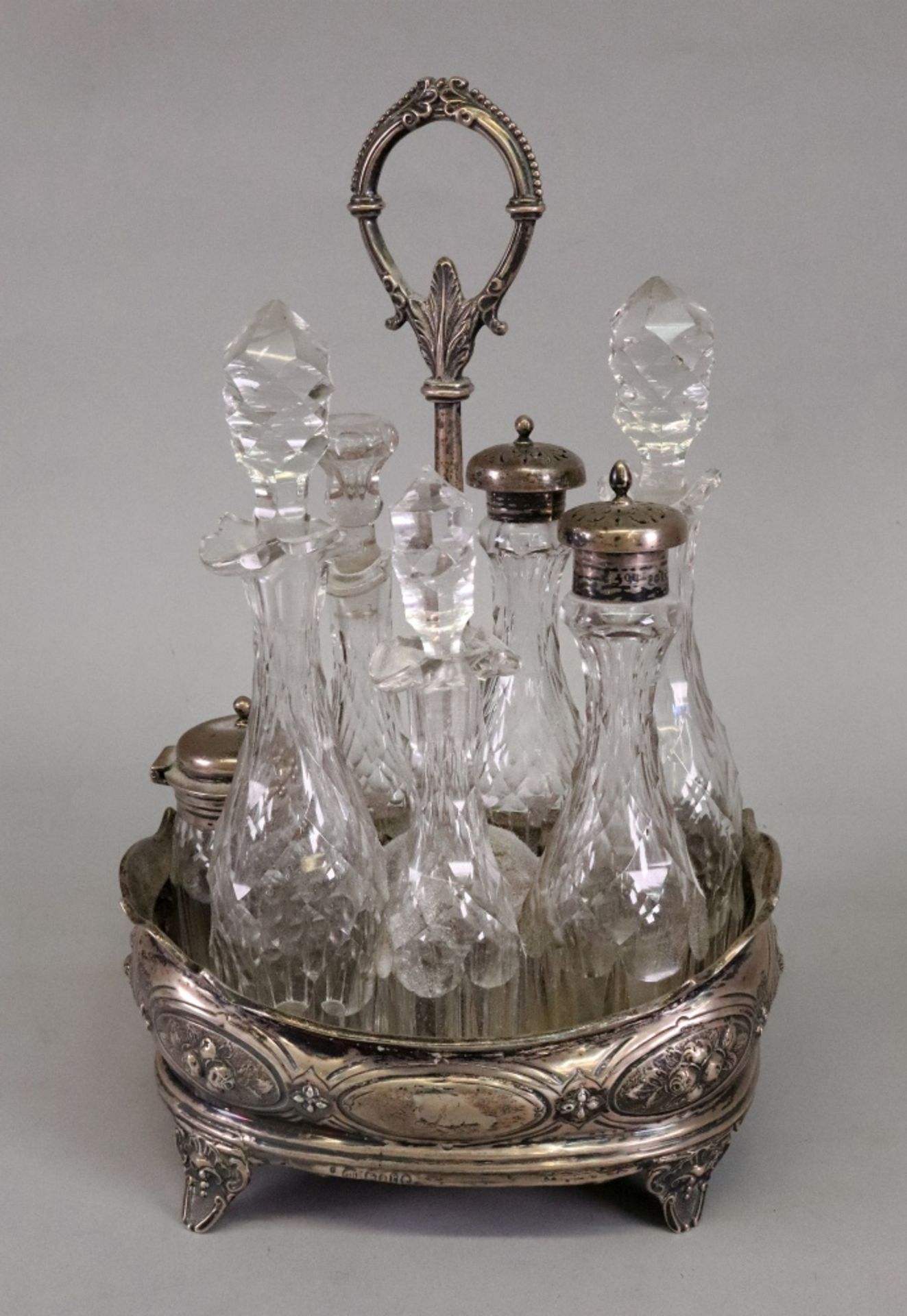 A Victorian oval silver cruet stand, Charles Boyton, London 1872,