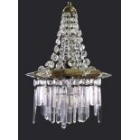 A Regency style gilt metal mounted glass chandelier,