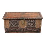 A Zanzibar hardwood chest, of panelled construction, decorated with typical brass studwork,