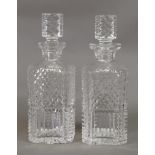 A pair of Waterford square section cut glass decanters, 25cm high.