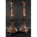 A pair of Dutch walnut and ebonised pricket type candlesticks, 18th century,