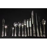 A walnut cased canteen of Kings pattern silver flatware and cutlery, Sheffield 1980, Warriss,