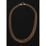 A 9ct gold triple strand multi-twist necklace of graduated design, on a bolt ring clasp,