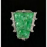 An 18ct white gold, jadeite and diamond-set clip/brooch, circa 1920s,