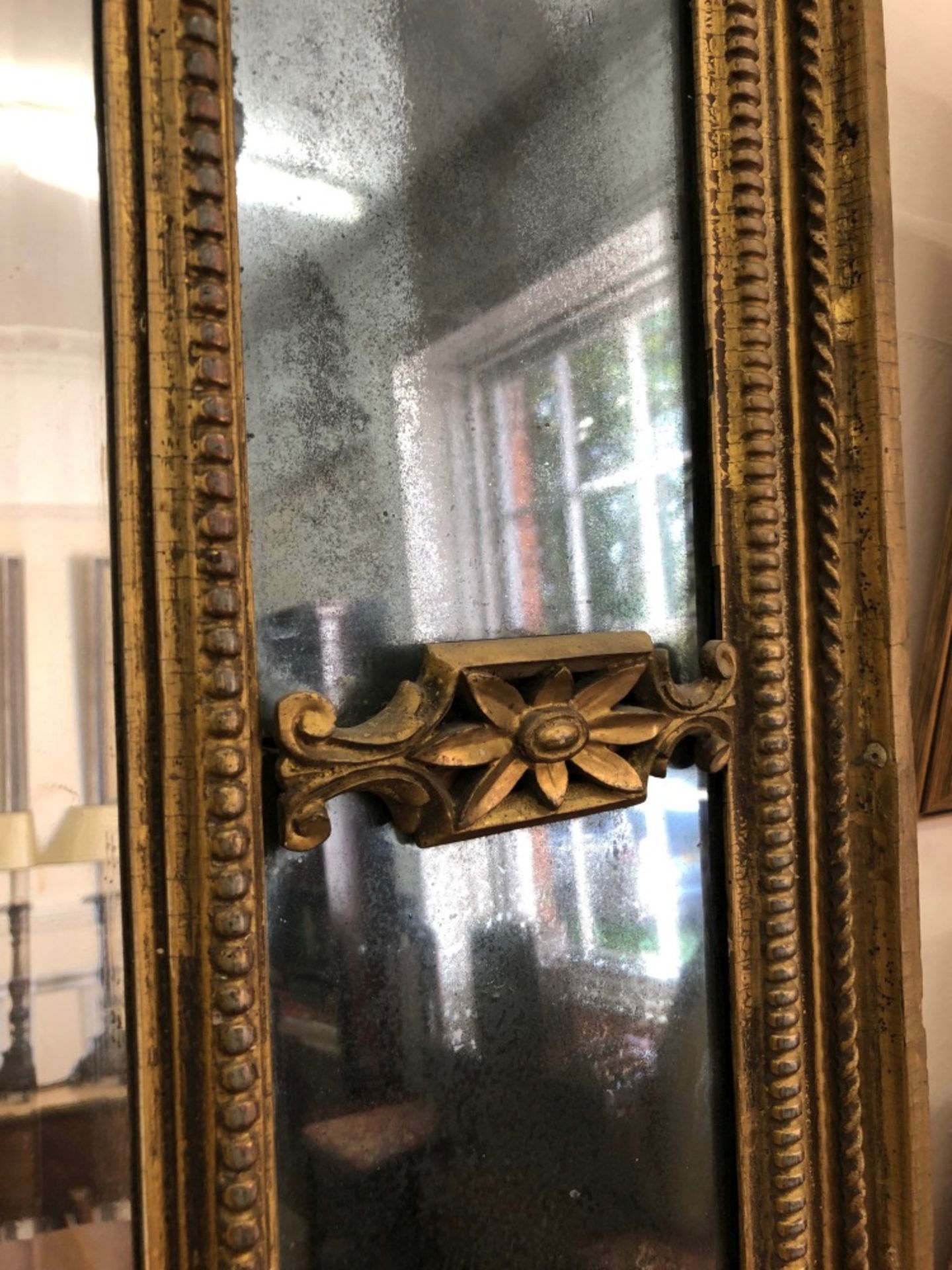 A moulded giltwood and gesso frame marginal wall mirror, early 19th century, - Image 12 of 12