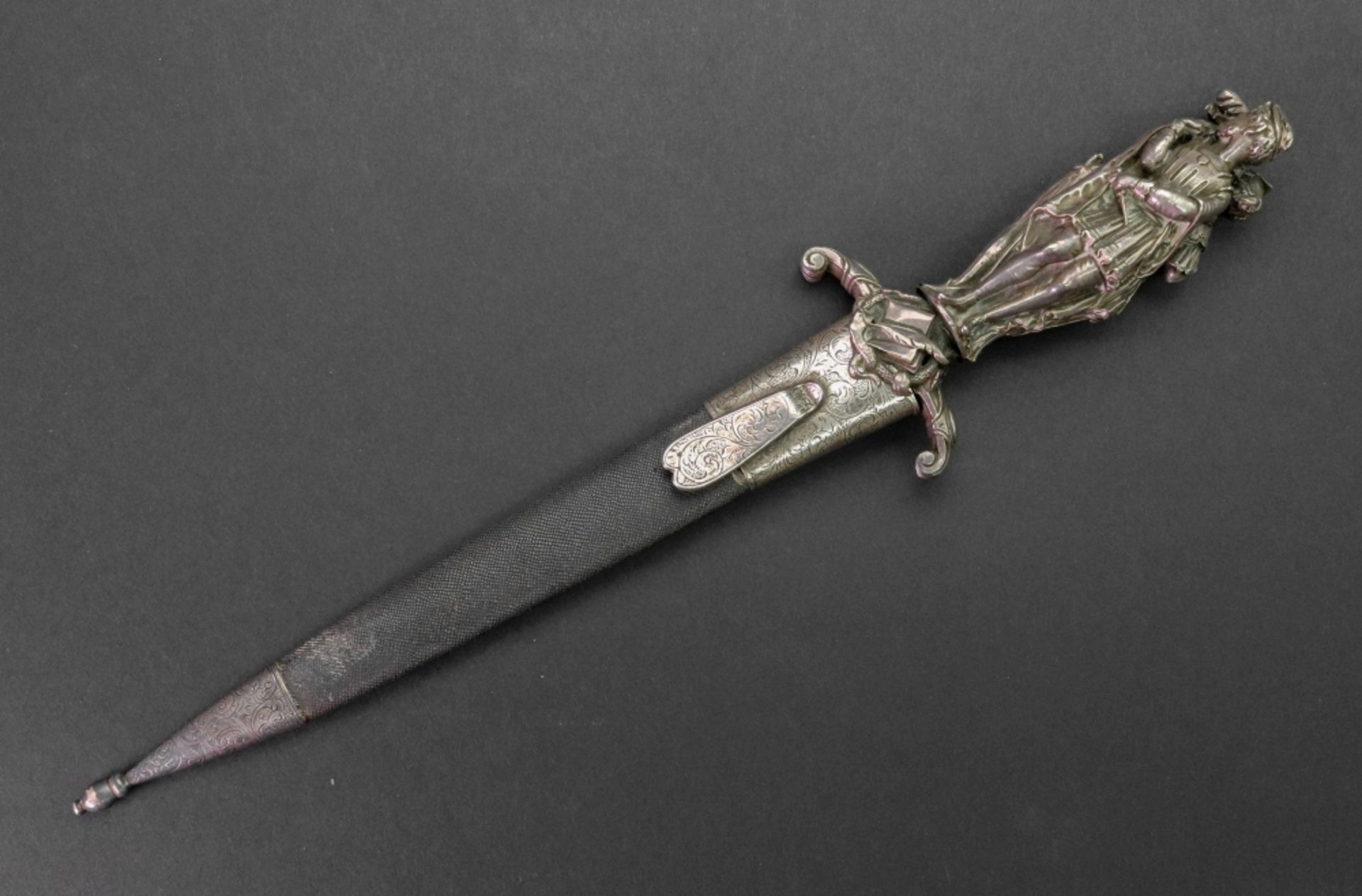 A silver handled dagger, cast as three standing figures dressed in period costume, - Image 2 of 7