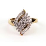 A modern marquise shaped cluster ring,