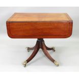 A Regency mahogany ebony strung breakfast table, with hinged drop leaves, end drawer,