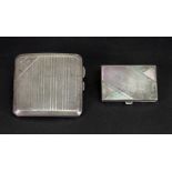 An engine turned silver cigarette case, Chester 1922, curved to fit the pocket,