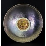 A deep circular silver bark finish dish, Stuart Devlin, London 1977,