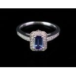 An 18ct white gold, tanzanite and diamond-set dress ring, of canted plaque design,