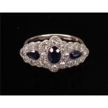 An 18ct gold, sapphire and diamond-set dress ring,