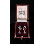 A pair of 9ct gold, aquamarine and ruby-set pendant earrings, the circular-cut claw-set aquamarines,