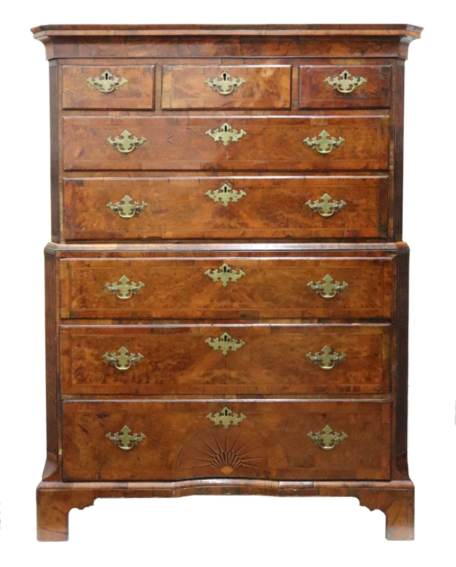 A George I walnut cross and feather banded tallboy chest, reduced in height,