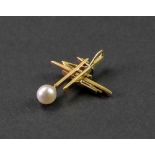 An 18ct gold, cultured pearl and diamond-set pendant, of abstract design,