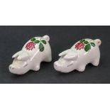 A pair of Plichta miniature figures of pigs, 3cm high x 7cm wide.